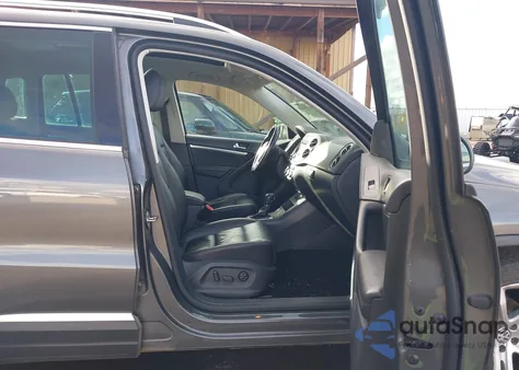 2013 Volkswagen Tiguan Sel z USA, uszkodzony, nr VIN WVGBV3AX0DW577035